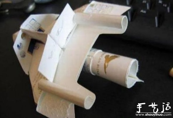 烟盒手工DIY纸模飞机的教程 -  www.shouyihuo.com