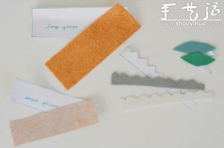 手工布艺制作带绿叶的花朵 -  www.shouyihuo.com