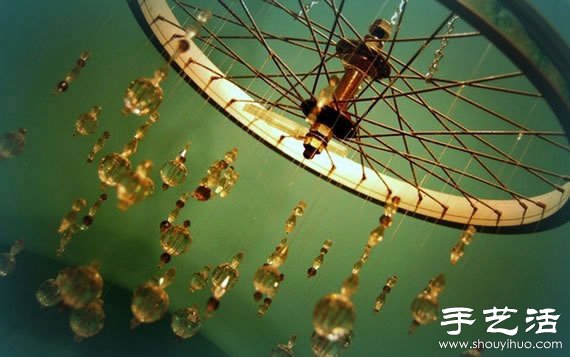 废弃自行车变废为宝手工DIY家居用品 -  www.shouyihuo.com