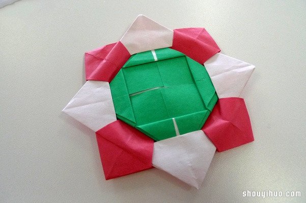 纸陀螺的制作方法 纸陀螺的折法图解教程 -  www.shouyihuo.com