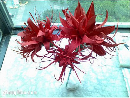 盛开热带花卉的折法图解 手工折纸漂亮花朵 -  www.shouyihuo.com