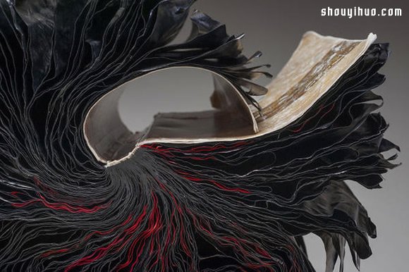 加热烘烤 柔软旧书化作贲张纸雕艺术品 -  www.shouyihuo.com