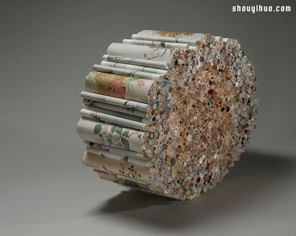加热烘烤 柔软旧书化作贲张纸雕艺术品 -  www.shouyihuo.com