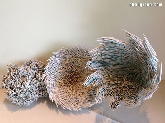 加热烘烤 柔软旧书化作贲张纸雕艺术品 -  www.shouyihuo.com
