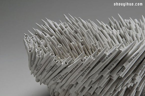 加热烘烤 柔软旧书化作贲张纸雕艺术品 -  www.shouyihuo.com