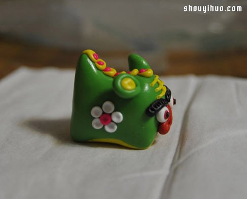 粘土制作可爱的单头布老虎儿童玩具图解教程 -  www.shouyihuo.com