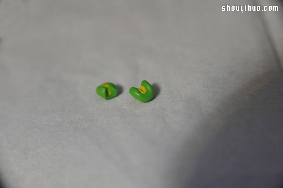 粘土制作可爱的单头布老虎儿童玩具图解教程 -  www.shouyihuo.com
