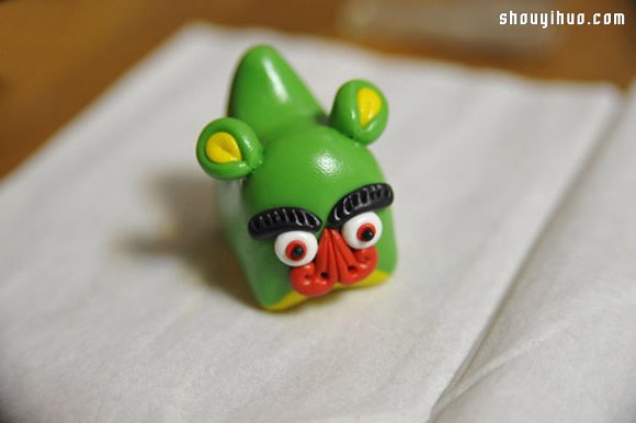 粘土制作可爱的单头布老虎儿童玩具图解教程 -  www.shouyihuo.com