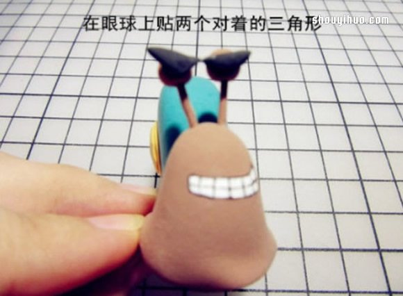海贼王电话虫蜗牛粘土制作图解教程 -  www.shouyihuo.com