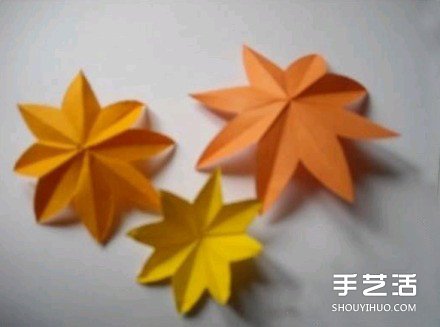 漂亮纸花DIY制作教程 简易纸花的做法图解 -  www.shouyihuo.com