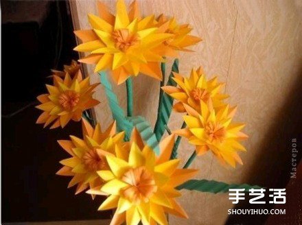 漂亮纸花DIY制作教程 简易纸花的做法图解 -  www.shouyihuo.com