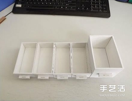 纸箱废物利用手工制作好用的柜子的过程图解 -  www.shouyihuo.com