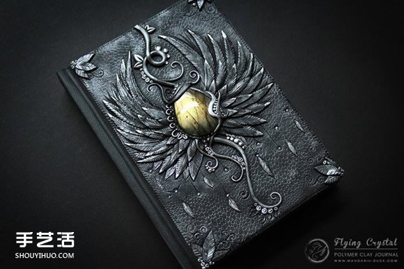 纯手工打造：带有图案的手工魔法书作品图片 -  www.shouyihuo.com