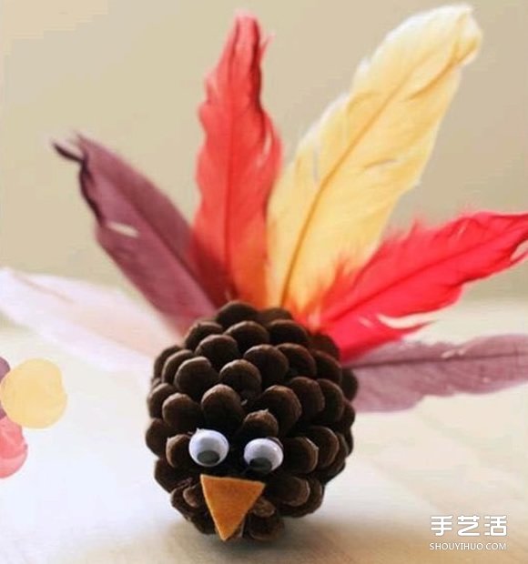 幼儿松果小制作：简单又可爱的手工小鸟制作 -  www.shouyihuo.com