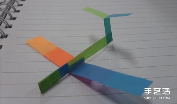 超久滑翔机折法图解 简易便签纸滑翔机制作 -  www.shouyihuo.com