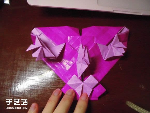 蝶恋花爱心折纸图解 创意爱心的折法步骤图 -  www.shouyihuo.com
