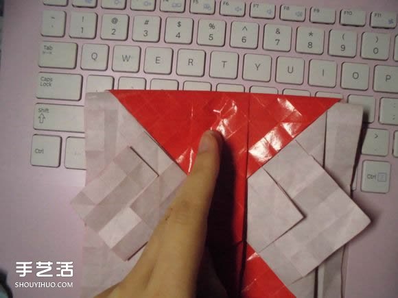 接吻鱼爱心折纸图解 超复杂桃心的折法过程 -  www.shouyihuo.com