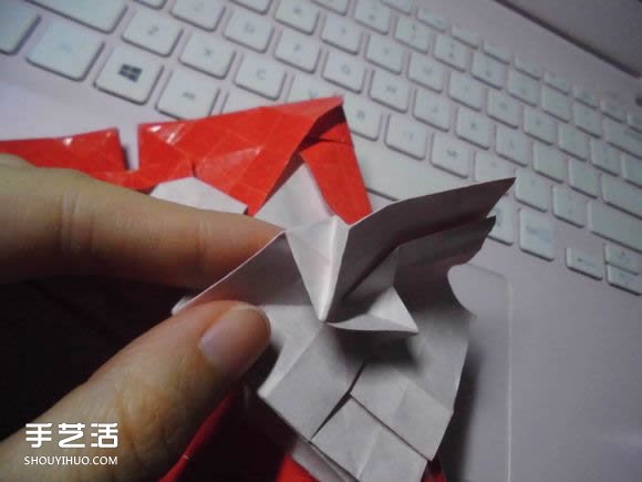 接吻鱼爱心折纸图解 超复杂桃心的折法过程 -  www.shouyihuo.com