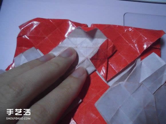 接吻鱼爱心折纸图解 超复杂桃心的折法过程 -  www.shouyihuo.com
