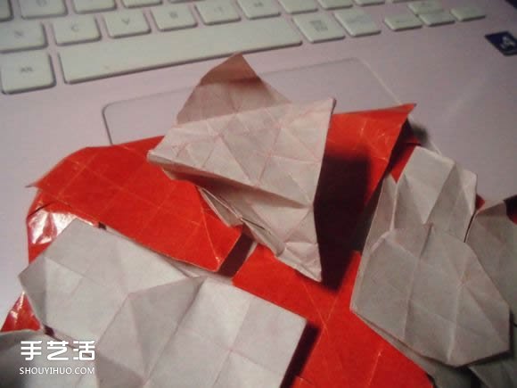 接吻鱼爱心折纸图解 超复杂桃心的折法过程 -  www.shouyihuo.com