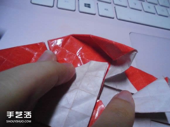 接吻鱼爱心折纸图解 超复杂桃心的折法过程 -  www.shouyihuo.com