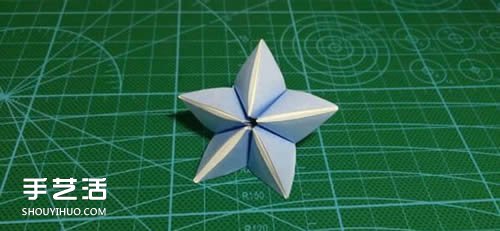 杨桃花怎么折图解教程 手工杨桃花折纸方法 -  www.shouyihuo.com