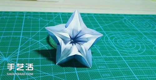 杨桃花怎么折图解教程 手工杨桃花折纸方法 -  www.shouyihuo.com