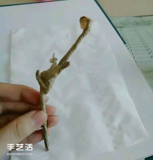 杨桃花怎么折图解教程 手工杨桃花折纸方法 -  www.shouyihuo.com