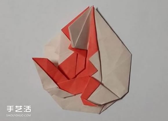 猴子胸章的折纸方法 手工折猴子图案折法图解 -  www.shouyihuo.com