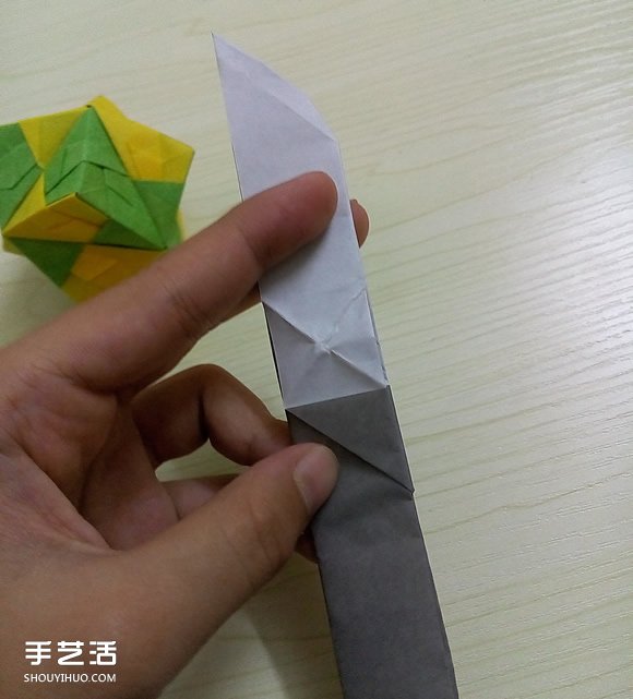 折纸折叠小刀的折法 手工折可折叠弹簧刀图解 -  www.shouyihuo.com