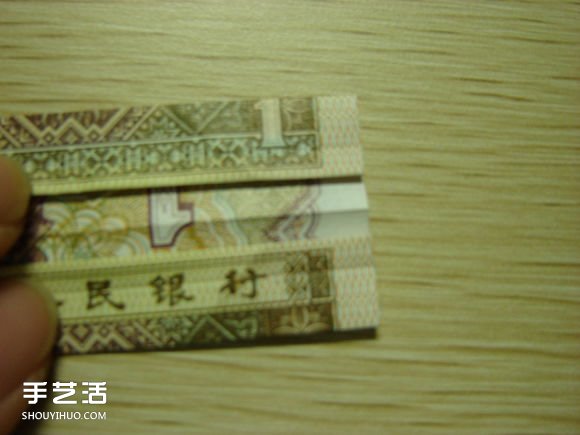 纸币折纸照相机图解 美金折相机的折法详解 -  www.shouyihuo.com