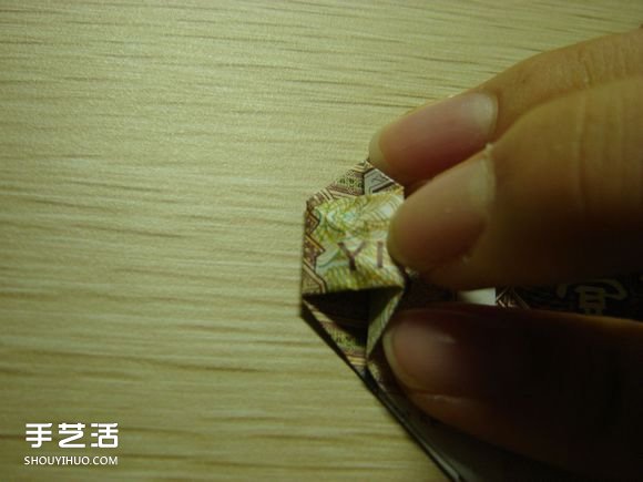 纸币折纸照相机图解 美金折相机的折法详解 -  www.shouyihuo.com