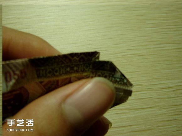 纸币折纸照相机图解 美金折相机的折法详解 -  www.shouyihuo.com