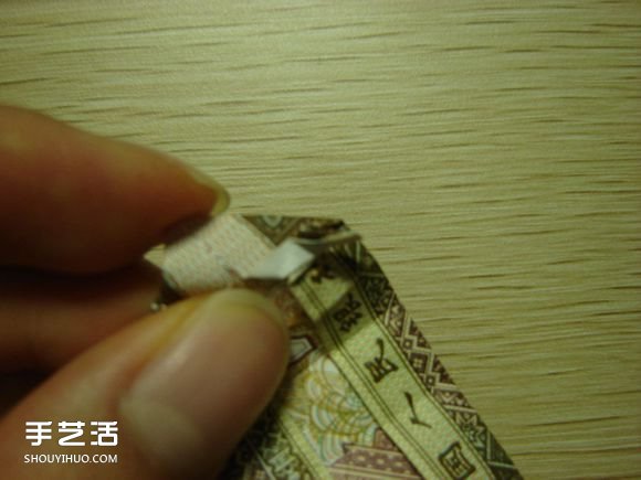 纸币折纸照相机图解 美金折相机的折法详解 -  www.shouyihuo.com