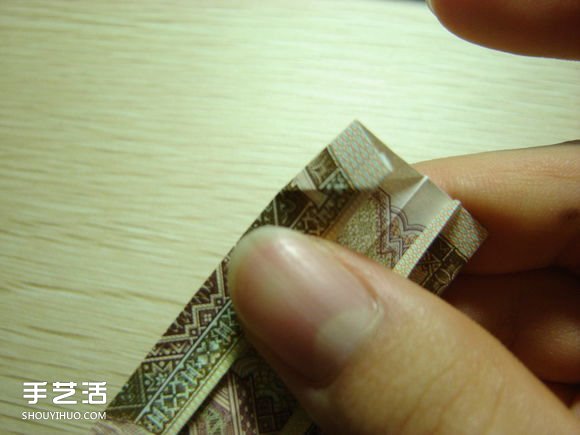 纸币折纸照相机图解 美金折相机的折法详解 -  www.shouyihuo.com