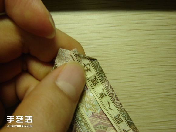 纸币折纸照相机图解 美金折相机的折法详解 -  www.shouyihuo.com