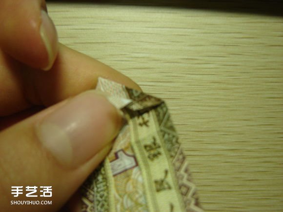 纸币折纸照相机图解 美金折相机的折法详解 -  www.shouyihuo.com