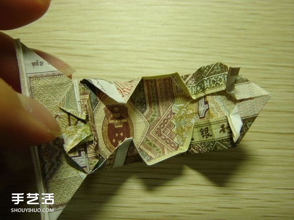 纸币折纸照相机图解 美金折相机的折法详解 -  www.shouyihuo.com