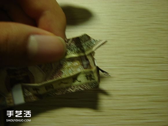 纸币折纸照相机图解 美金折相机的折法详解 -  www.shouyihuo.com