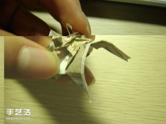 纸币折纸照相机图解 美金折相机的折法详解 -  www.shouyihuo.com