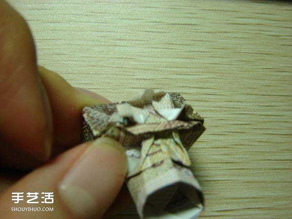 纸币折纸照相机图解 美金折相机的折法详解 -  www.shouyihuo.com
