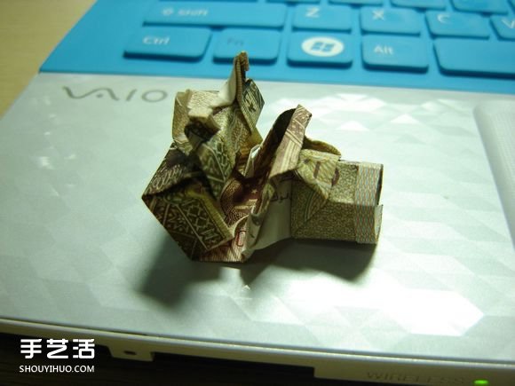 纸币折纸照相机图解 美金折相机的折法详解 -  www.shouyihuo.com