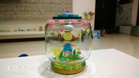衍纸小手工艺品教程：小女孩的美丽私家花园 -  www.shouyihuo.com