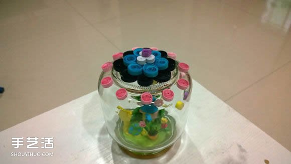 衍纸小手工艺品教程：小女孩的美丽私家花园 -  www.shouyihuo.com
