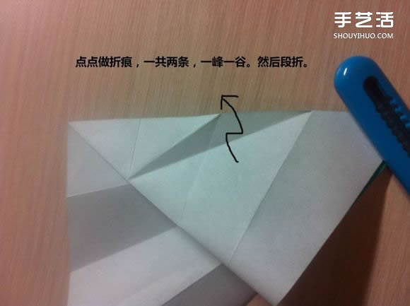 白天鹅折纸图解教程 纸折天鹅的方法步骤 -  www.shouyihuo.com