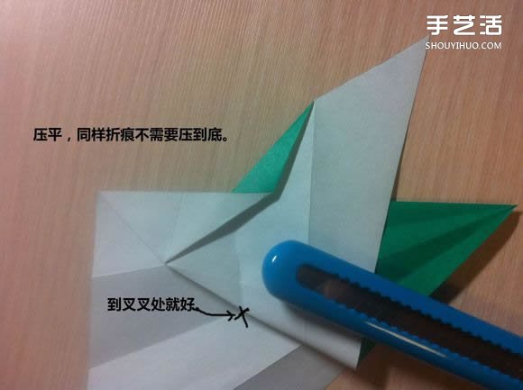 白天鹅折纸图解教程 纸折天鹅的方法步骤 -  www.shouyihuo.com