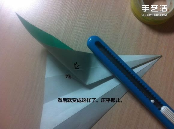 白天鹅折纸图解教程 纸折天鹅的方法步骤 -  www.shouyihuo.com