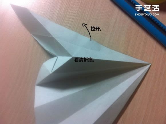 白天鹅折纸图解教程 纸折天鹅的方法步骤 -  www.shouyihuo.com