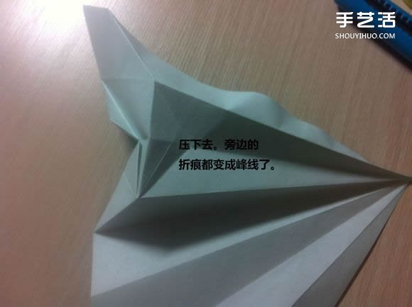 白天鹅折纸图解教程 纸折天鹅的方法步骤 -  www.shouyihuo.com