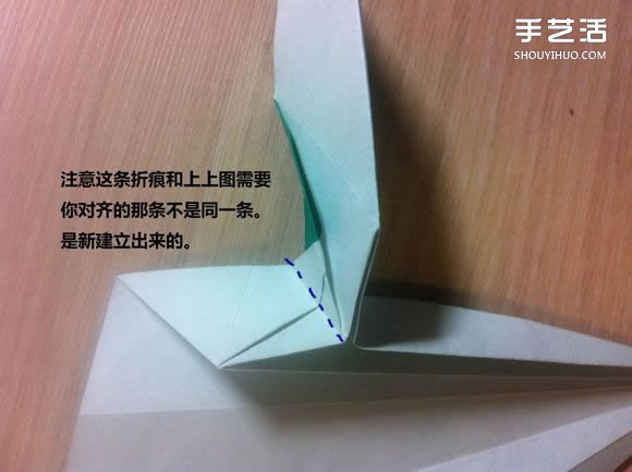 白天鹅折纸图解教程 纸折天鹅的方法步骤 -  www.shouyihuo.com